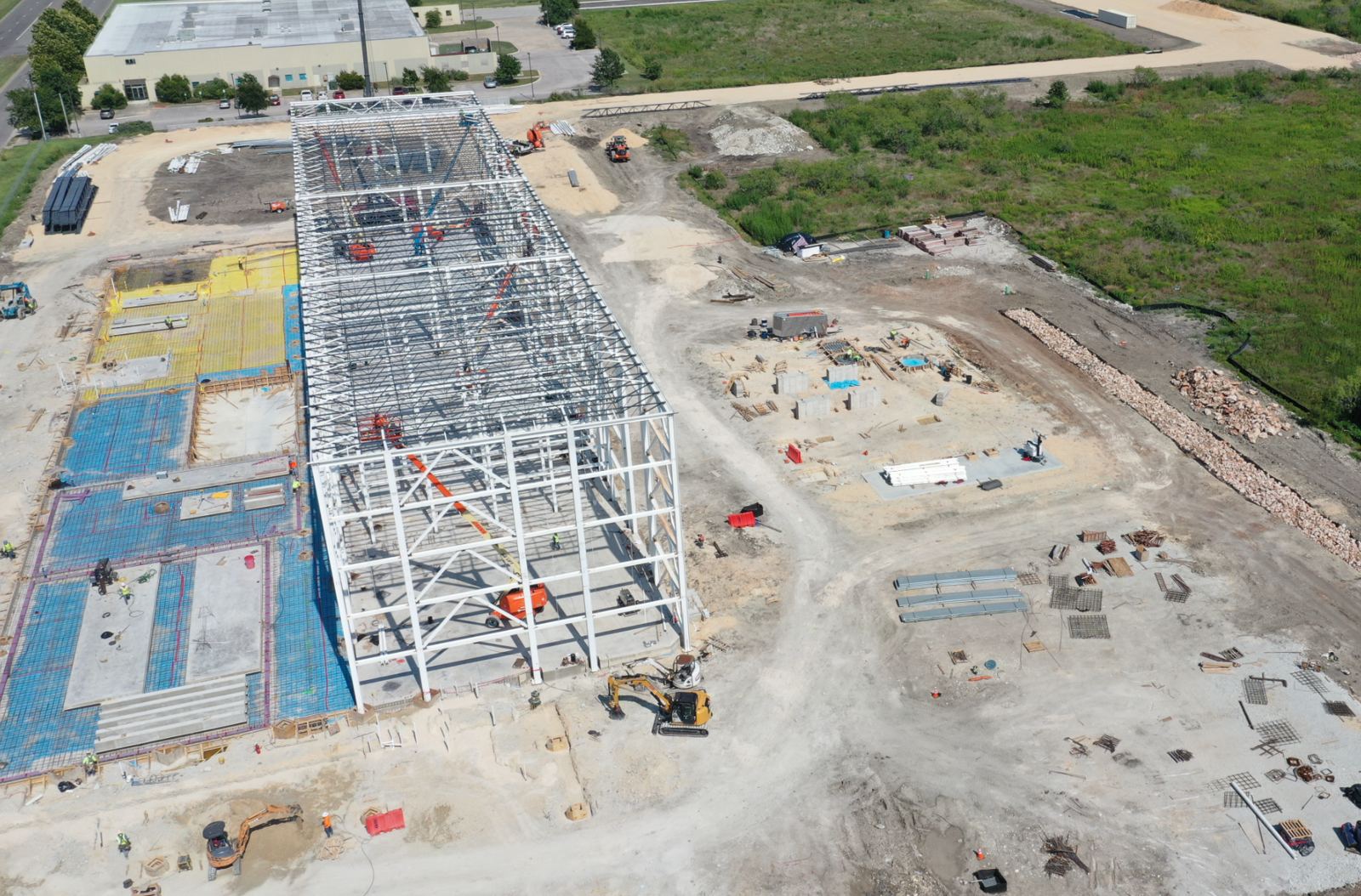 Aerial view of a steel-frame industrial building under construction